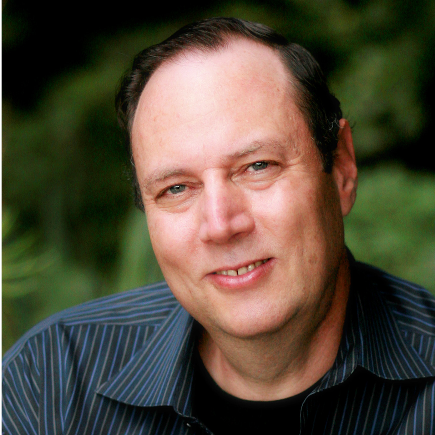 Headshot of Eric Rabinowitz.