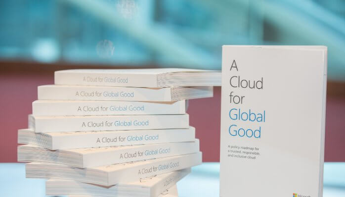 Image of a stack of Microsoft's Cloud for Global Good Initiative handbooks.